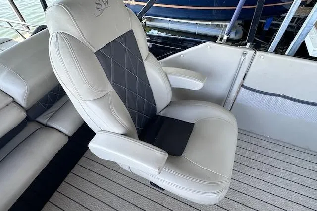 Slide: The Image of Luxury seating on 2021 Silver Wave 2410 SW7 JS boat, featuring plush upholstery. - 17
