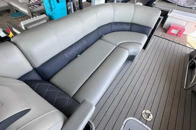 Slide: The Image of Luxurious seating on 2021 Silver Wave 2410 SW7 JS pontoon boat, featuring gray upholstery. - 19