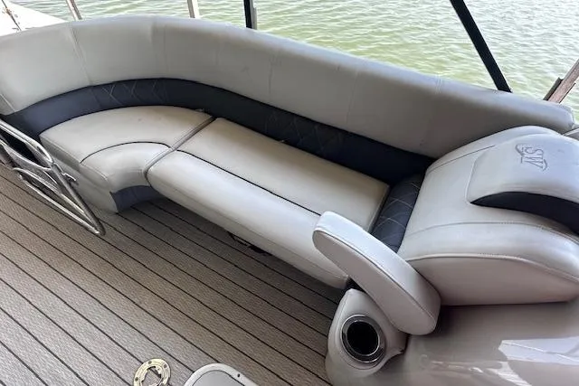 Slide: The Image of Luxurious seating on 2021 Silver Wave 2410 SW7 JS pontoon boat, featuring elegant upholstery. - 20