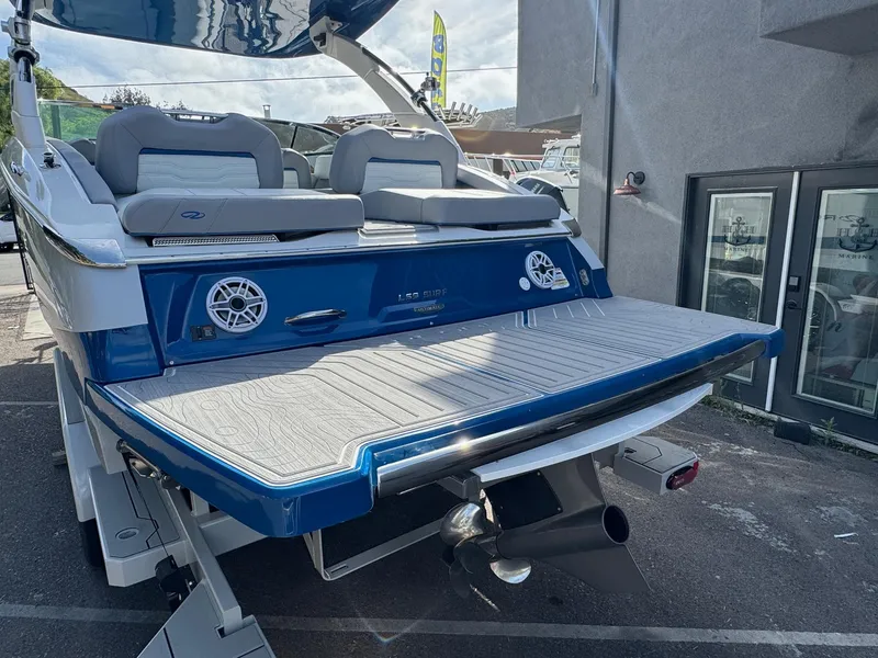 Slide: The Image of 2025 Regal LS9 Surf boat with spacious deck and modern design. - 31