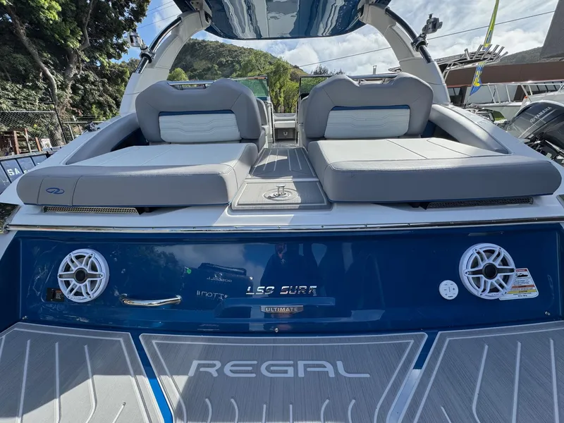 Slide: The Image of 2025 Regal LS9 Surf boat with sleek design, comfortable seating, and premium audio system. - 36