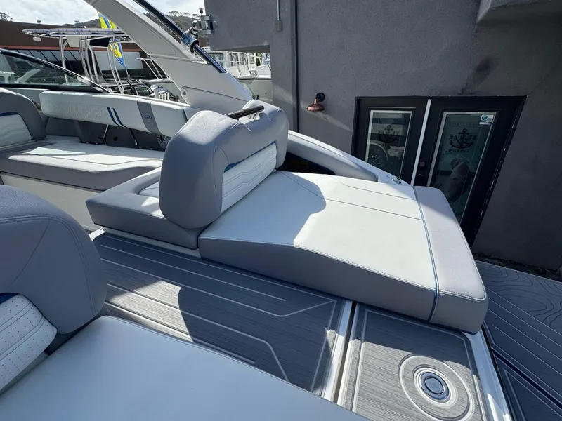 Slide: The Image of 2025 Regal LS9 Surf boat with sleek, modern seating and stylish design. - 39