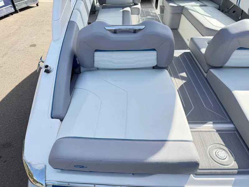 Slide: The Image of 2025 Regal LS9 Surf boat interior with gray and white seating. - 41