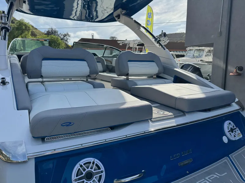 Slide: The Image of 2025 Regal LS9 Surf boat with luxurious seating and modern design. - 43