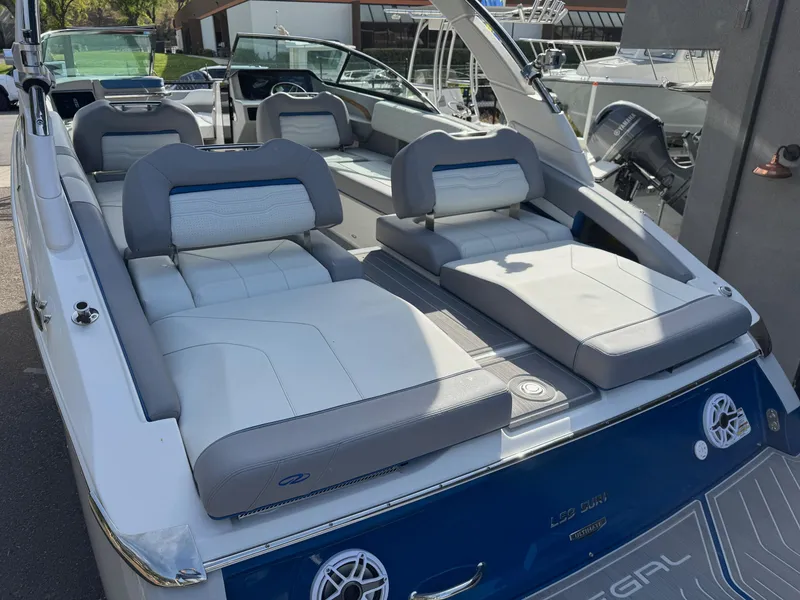 Slide: The Image of 2025 Regal LS9 Surf boat with luxurious seating and modern design. - 44