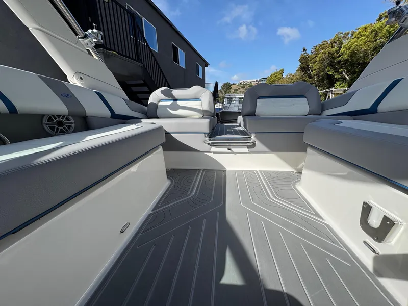 Slide: The Image of 2025 Regal LS9 Surf boat interior with modern seating and sleek design. - 48