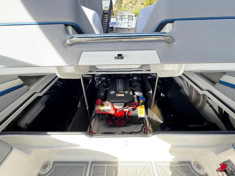 Slide: The Image of 2025 Regal LS9 Surf boat engine compartment, showcasing powerful engine and sleek design. - 51