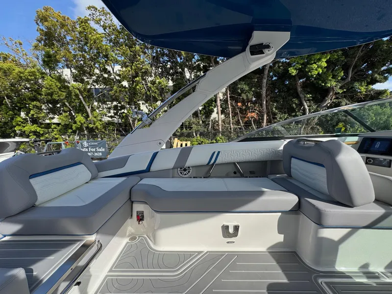 Slide: The Image of 2025 Regal LS9 Surf boat interior with sleek seating and modern design. - 55