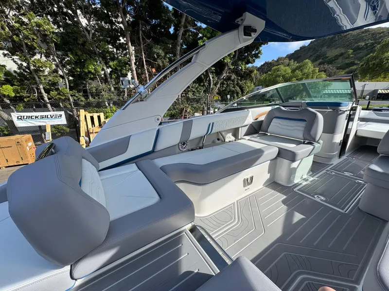 Slide: The Image of 2025 Regal LS9 Surf boat interior with sleek seating and modern design. - 56
