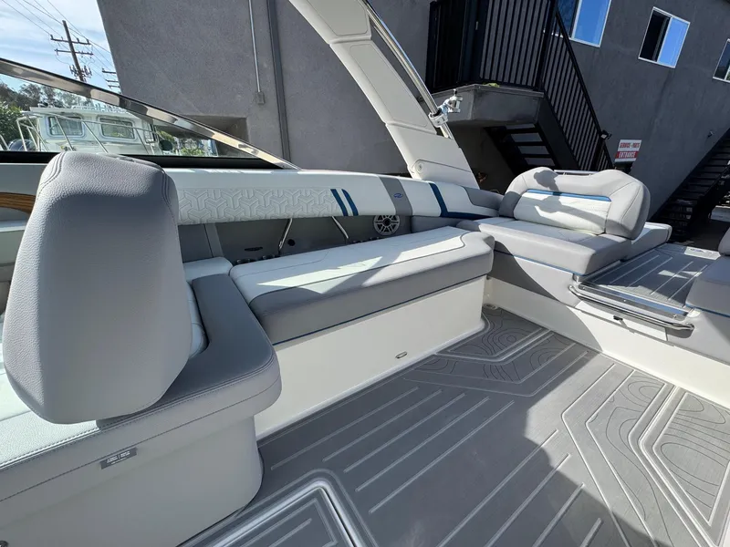 Slide: The Image of 2025 Regal LS9 Surf boat interior with sleek seating and modern design. - 61