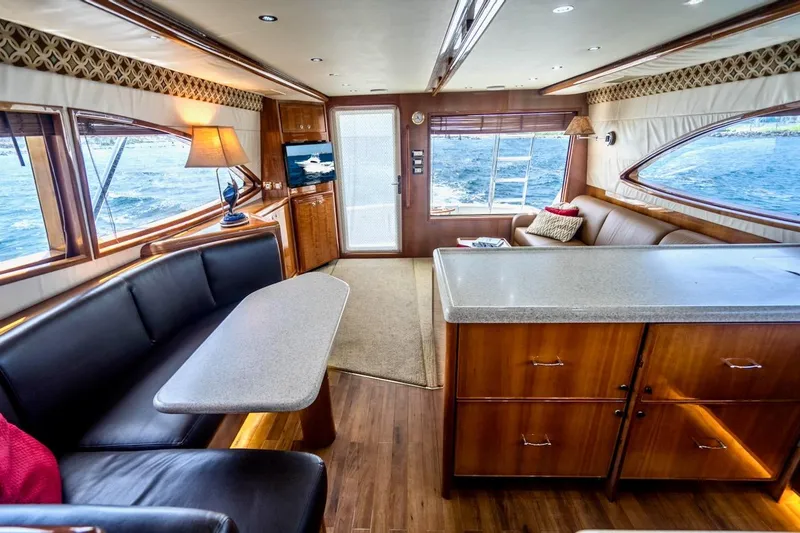 Slide: The Image of Luxurious interior of a 2001 Bertram 510 Convertible yacht with elegant furnishings. - 10