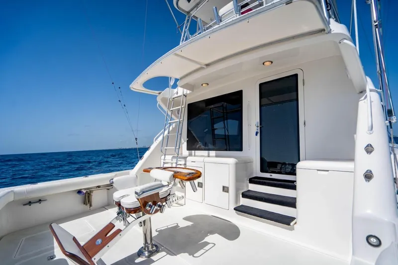 Slide: The Image of 2001 Bertram 510 Convertible yacht deck with fishing chair, ocean view. - 27
