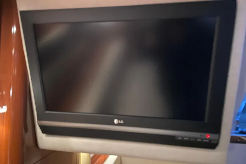 Slide: The Image of LG TV inside 2008 Sea Ray 330 Sundancer yacht cabin. - 28