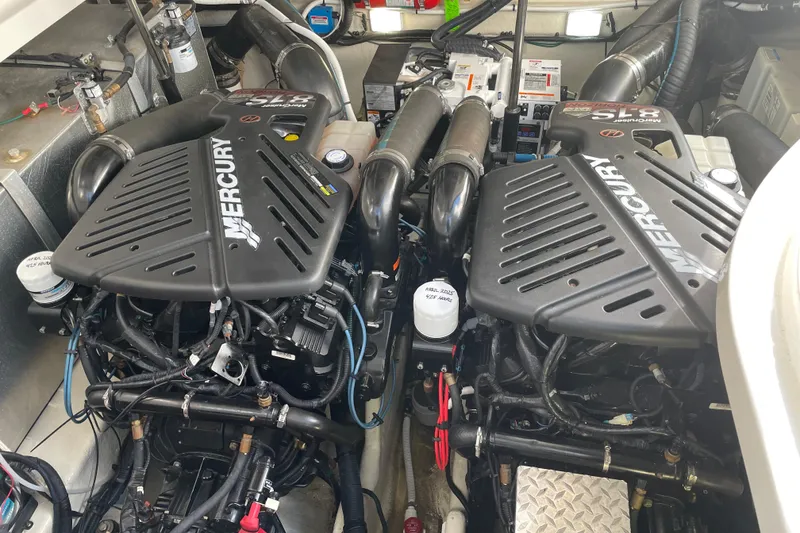 Slide: The Image of Engine compartment of a 2008 Sea Ray 330 Sundancer with twin Mercury engines. - 45