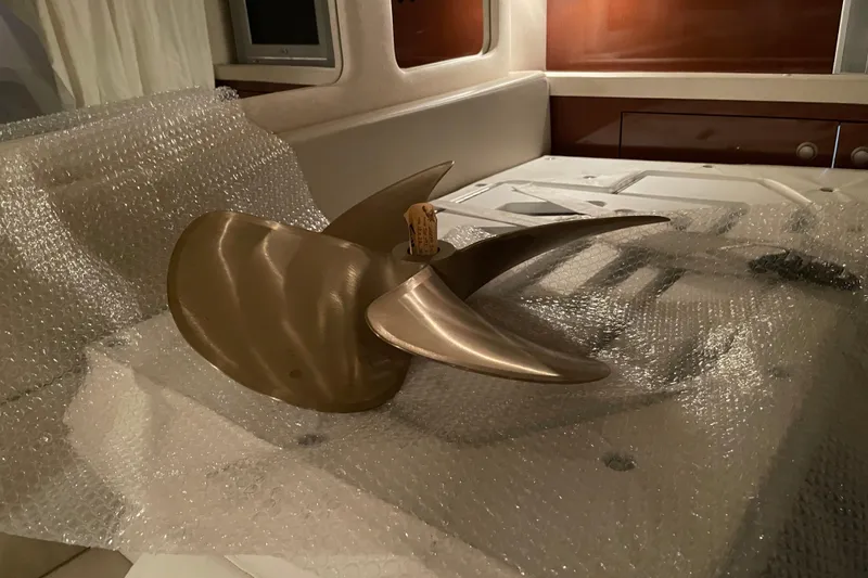 Slide: The Image of Propeller on a 2008 Sea Ray 330 Sundancer, wrapped in bubble wrap for protection. - 49