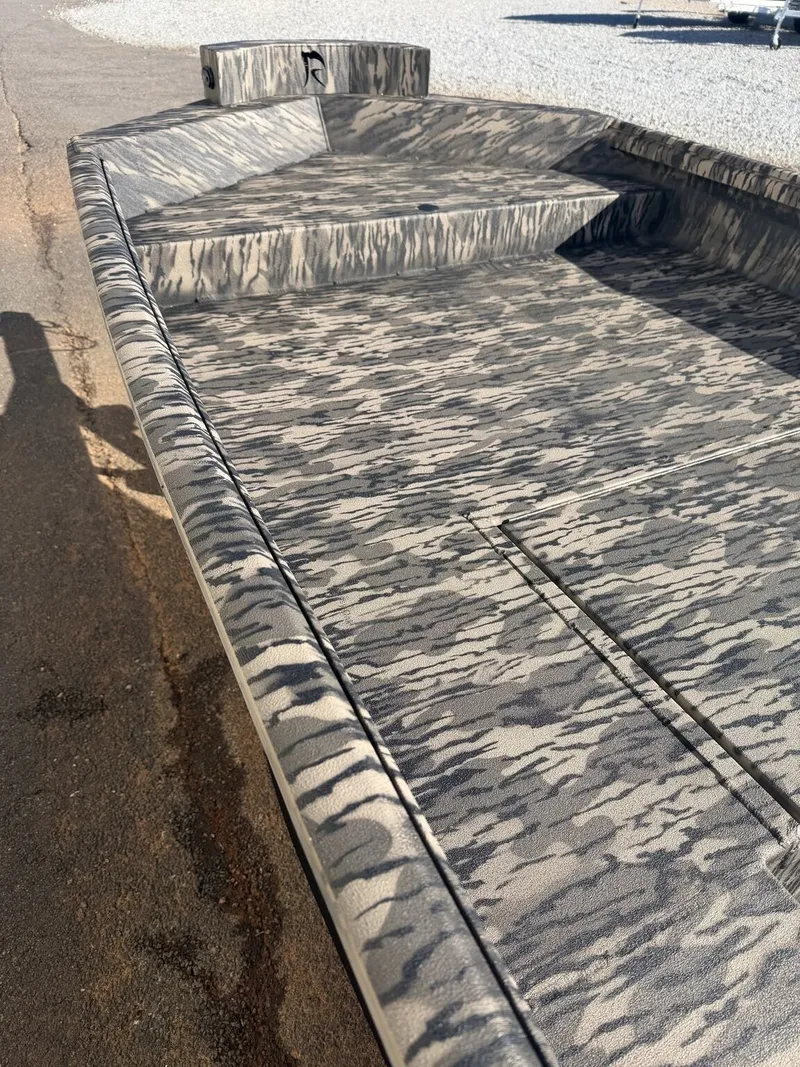 Slide: The Image of Reaper Boats 756 STEP TRANSOM 2026 with camouflage pattern design. - 8