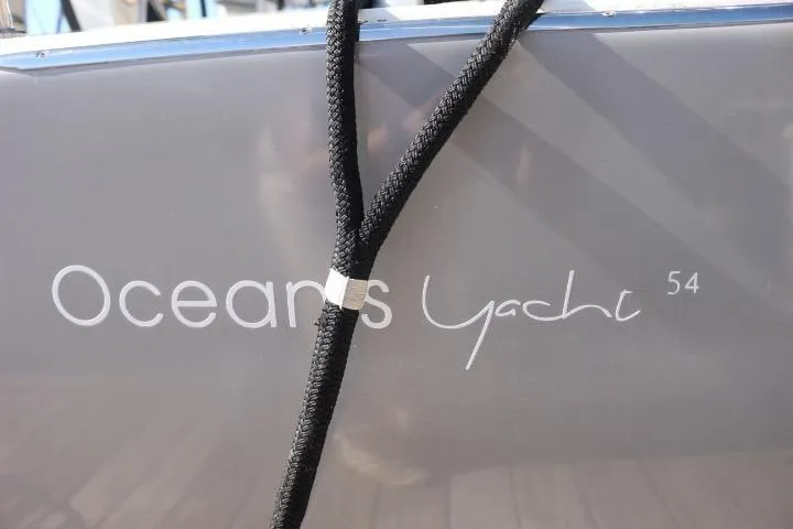 Slide: The Image of Close-up of rigging on a 2021 Beneteau Oceanis Yacht 54 sailboat. - 32