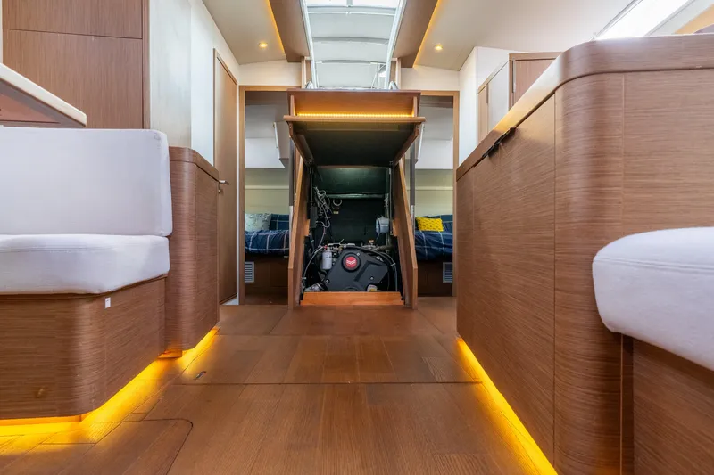 Slide: The Image of Interior of 2021 Beneteau Oceanis Yacht 54, showcasing modern design and engine access. - 43
