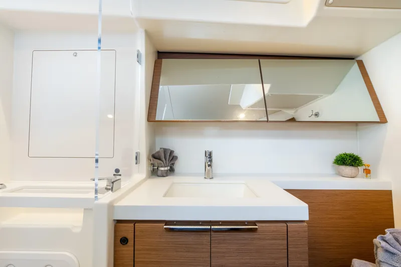 Slide: The Image of Luxurious bathroom interior of 2021 Beneteau Oceanis Yacht 54 with modern fixtures. - 59