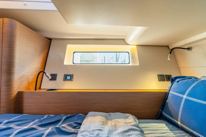 Slide: The Image of Luxurious cabin interior of 2021 Beneteau Oceanis Yacht 54 with modern design elements. - 62