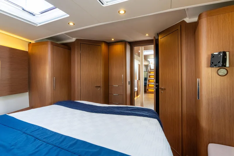Slide: The Image of Luxurious interior of 2021 Beneteau Oceanis Yacht 54, featuring elegant wood finishes and modern design. - 71