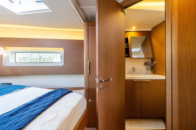 Slide: The Image of Luxurious interior of 2021 Beneteau Oceanis Yacht 54 with bedroom and ensuite bathroom. - 72