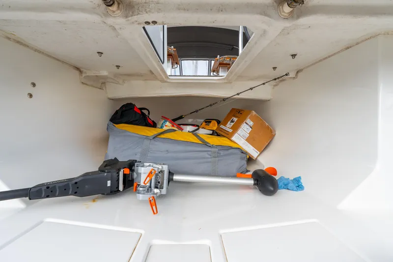 Slide: The Image of Storage compartment of 2021 Beneteau Oceanis Yacht 54 with equipment and supplies. - 76
