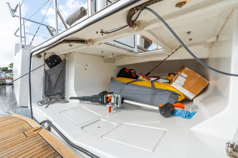 Slide: The Image of Storage compartment of 2021 Beneteau Oceanis Yacht 54 with equipment and supplies. - 77