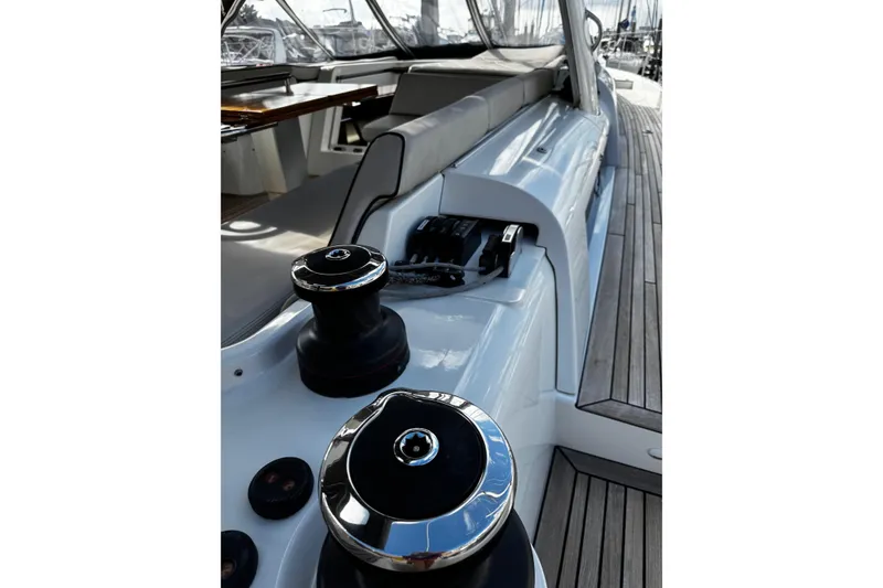Slide: The Image of 2021 Beneteau Oceanis Yacht 54 docked, showcasing sleek design and modern features. - 8