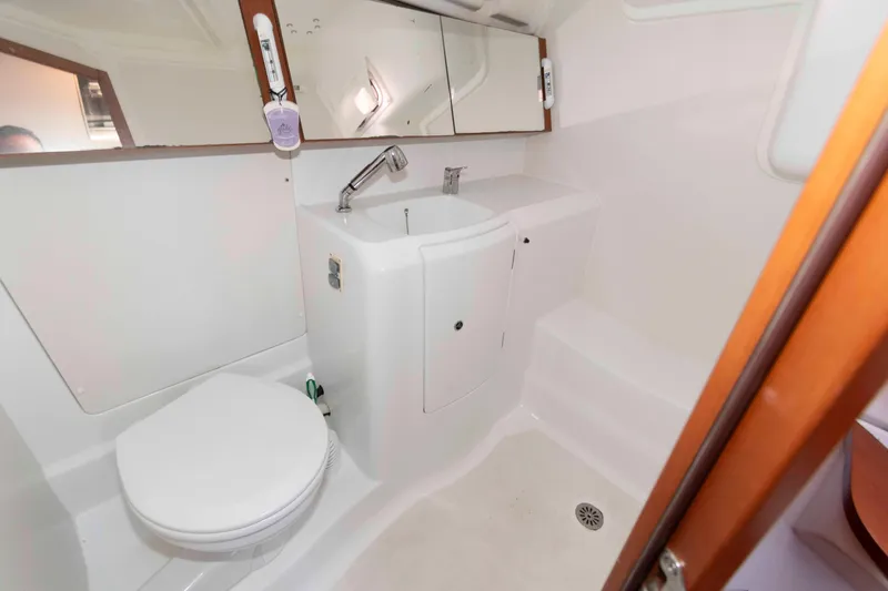 Slide: The Image of Bathroom interior of 2015 Beneteau Oceanis 37 yacht, featuring sink and toilet. - 17