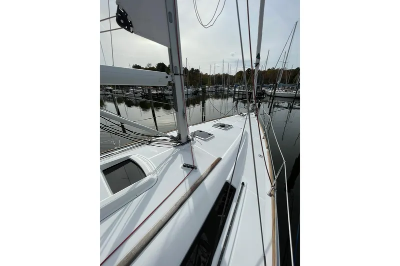 Slide: The Image of Cockpit of 2015 Beneteau Oceanis 37 sailboat with steering wheel and seating. - 3