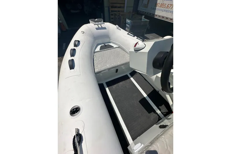 Slide: The Image of 2026 East Marine NEW 320 inflatable boat with Linergy electric motor, interior view. - 13