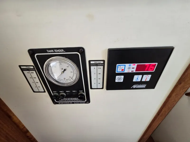 Slide: The Image of Nordic Tug 32 (2001) control panel with tank tender and temperature display. - 15