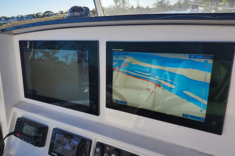 Slide: The Image of Dashboard of 2015 Southport 29 Tournament Edition with navigation screens and controls. - 11