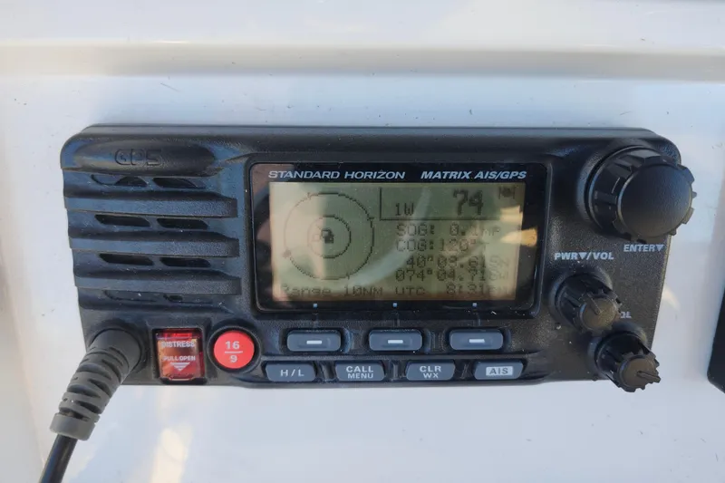 Slide: The Image of Standard Horizon Matrix AIS/GPS radio on 2015 Southport 29 Tournament Edition boat. - 13