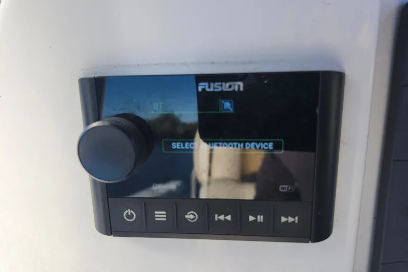 Slide: The Image of Fusion audio system on 2015 Southport 29 Tournament Edition boat, displaying Bluetooth settings. - 14