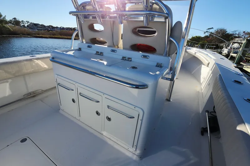 Slide: The Image of 2015 Southport 29 Tournament Edition boat interior with seating and storage compartments. - 17