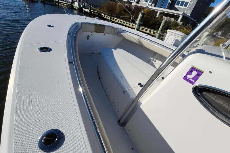 Slide: The Image of 2015 Southport 29 Tournament Edition boat interior, featuring spacious seating and sleek design. - 22
