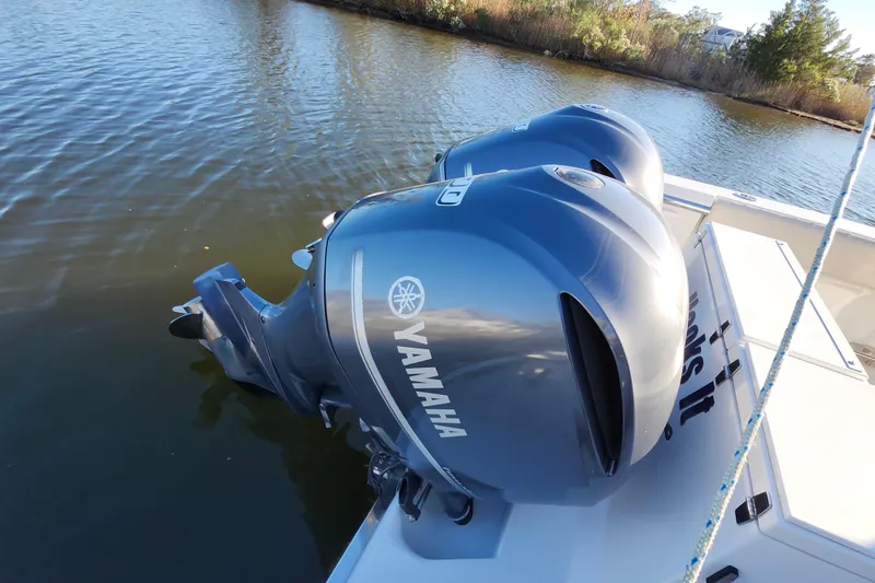 Slide: The Image of Twin Yamaha outboard engines on a 2015 Southport 29 Tournament Edition boat. - 31