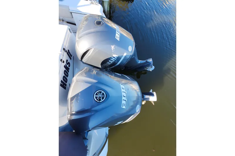 Slide: The Image of Twin Yamaha outboard engines on a 2015 Southport 29 Tournament Edition boat. - 34