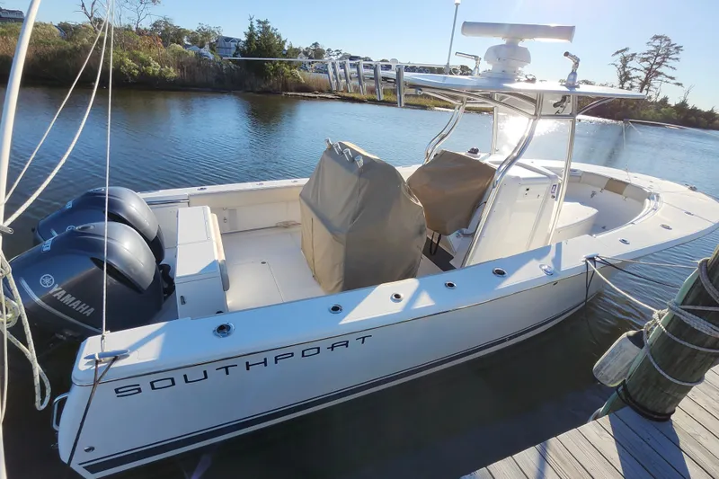 Slide: The Image of 2015 Southport 29 Tournament Edition boat docked with twin Yamaha engines. - 6