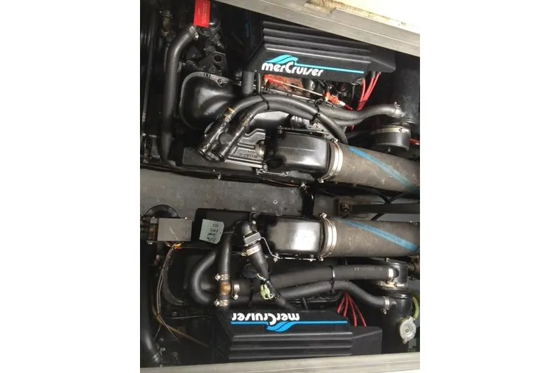 Slide: The Image of Engine compartment of a 1992 Sea Ray 370 Sundancer with MerCruiser engines. - 6