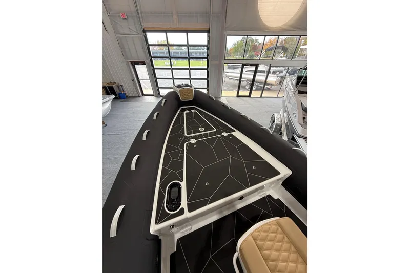 Slide: The Image of 2026 Highfield Sport 800 boat interior with modern design and geometric patterns. - 11