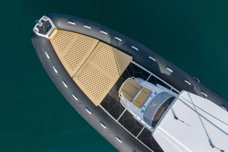 Slide: The Image of Manufacturer Provided Image: Aerial view of 2025 Highfield Sport 800 boat with tan seating and sleek design. - 27