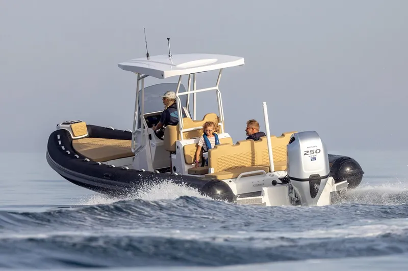 Slide: The Image of Manufacturer Provided Image: 2025 Highfield Sport 800 boat cruising on open water with passengers. - 29