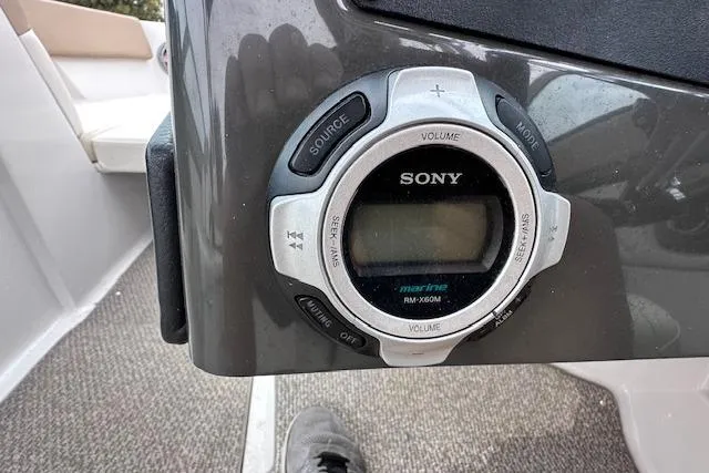 Slide: The Image of Sony marine audio control on 2013 Four Winns H210SS boat dashboard. - 18