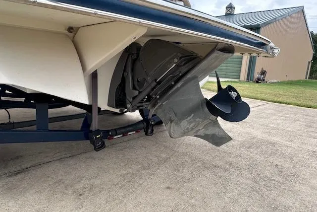 Slide: The Image of 2013 Four Winns H210SS boat propeller and stern on a trailer. - 9