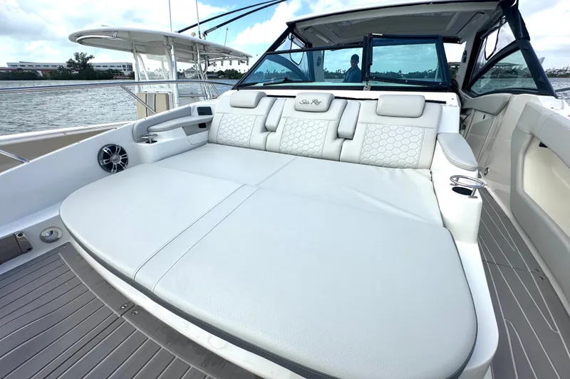 Slide: The Image of 2022 Sea Ray Sundancer 320 Outboard with spacious, luxurious seating on deck. - 19