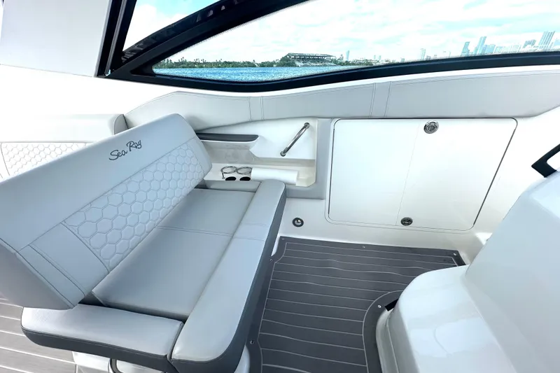 Slide: The Image of 2022 Sea Ray Sundancer 320 Outboard interior with sleek seating and modern design. - 38