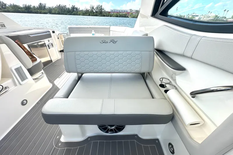 Slide: The Image of 2022 Sea Ray Sundancer 320 Outboard interior with luxurious seating and modern amenities. - 39